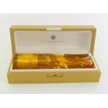 A bottle of Louis Roederer 2009 Cristal Brut champagne in original wrap and golden presentation