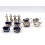 Four 3-piece silver condiment sets by William Suckling Ltd.,Birmingham, 1929/30/31/32, together with