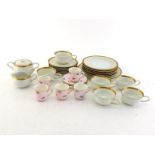 A Rosenthal ceramic teaset comprising six each cups, saucers, plates, a cake plate, milk jug and