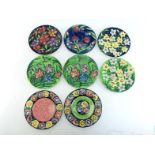 Maling ware display plates. A pair of pansy pattern, a pair of iris pattern, a pair of daffodil