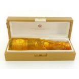 A bottle of Louis Roederer 2006 Cristal Brut champagne in original wrap in golden presentation case,