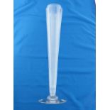 A tall tapering conical studio glass vase the sides with slim etched panels rising the full