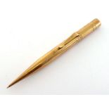 S. Mordan & Co., a 9 carat gold retractable pencil, hallmarked London 1921, 17.8gms CONDITION: good,