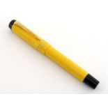 PARKER, Duofold, a Mandarin yellow resin fountain pen, no. 8044, with medium nib, 18 carat gold