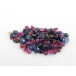 A quantity of untested loose polished pink and blue sapphires, approx. 9.23 carats, various cuts and