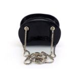 A Gianfranco Ferre patent leather evening bag with silvertone chain. Labelled "Gianfranco Ferre