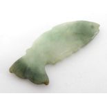 A carved jade fish pendant, 4cm. long.