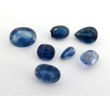 A mixed lot of loose cut sapphires, the largest a 8 x 6mm oval cut, totalling approx. 5.54 carats (