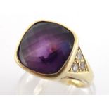 A gentleman's amethyst and diamond dress ring, the cushion shaped faceted stone 10 x 10mm, rub