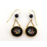 A pair of gold and micromosaic earrings, each drop composed of an oval black ground micromosaic of a