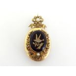 A 19th century gold, diamond, pearl and paste set locket pendant, the central purple paste inset