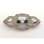 An Art Deco sapphire and diamond brooch, the geometric design millgrain set overall with rose