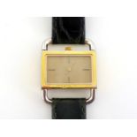 HERMES, a gilt metal quartz wrist watch, with 'driver's watch' style bezel and lugs, textured gilt