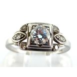 An Art Deco diamond ring, the central brilliant approx. 0.34 carat, box set to diamond set