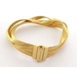 MARCO BICEGO, an 18 carat gold Marrakech bracelet, 19cm long, 40.5gms CONDITION: good