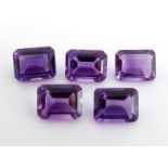 A mixed lot of loose emerald cut amethysts, totalling approx. 10.66 carats (VAT will be charged on