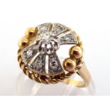 A French 18 carat gold, platinum and diamond dress ring, the circular openwork bezel centred on a