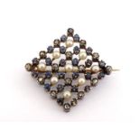 An early 20th century French 18 carat gold, sapphire, diamond and seed pearl brooch, composed of a
