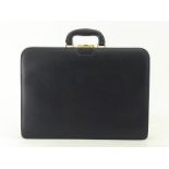 A Gianfranco Ferre gentleman's leather briefcase with goldtone closure, complete with key. Smart