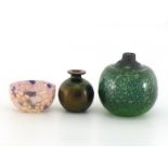 Three studio glass items:- A blown glass spherical vase with dark metallic sheen, the base inscribed