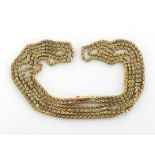 A Victorian gold sautoir, composed of box links, to a snap clasp stamped ‘9c’, 134cm, 18gms