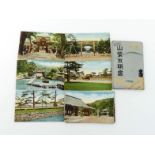 A set of eighteen postcards of old Kyoto in original Japanese wrap, including photos of the Inclined