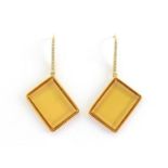 A pair of 18 carat gold, diamond and citrine earrings, the rectangular tablet cut citrine 20 x 15mm,