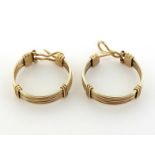 A pair of yellow metal (tests 14 carat gold) hoop earrings, post fittings, 24mm inner diameter, 12.