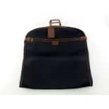 A Gianfranco Ferre suit Carrier travel bag with leather accents. Labelled inside Gianfranco Ferre #