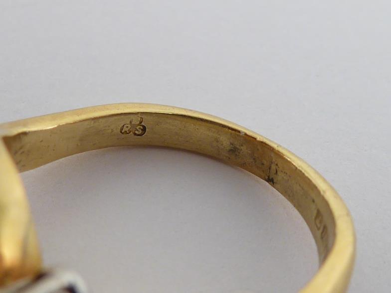 An 18 carat gold and diamond dress ring, the undulating bezel set either side with graduated - Image 6 of 6