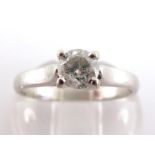 An 18 carat white gold and single stone diamond ring, the brilliant 0.49 carat (engraved weight),