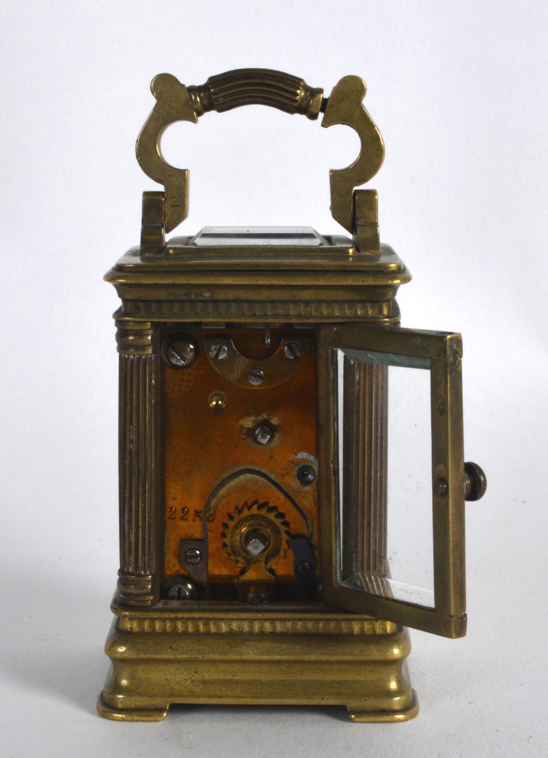 AN EARLY 20TH CENTURY FRENCH MINIATURE CARRIAGE CLOCK with white enamel dial overlaid in gilt - Image 3 of 4