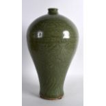 A CHINESE MING DYNASTY CELADON MEIPING VASE engraved all over with floral sprays upon a crackled