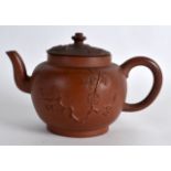 A RARE MID 18TH CENTURY EUROPEAN STONEWARE TEAPOT AND COVER decorated in relief with flowers and