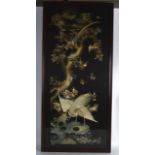 A GOOD LARGE 19TH CENTURY FRAMED CHINESE BLACK SILKWORK PANEL depicting exotic birds standing upon