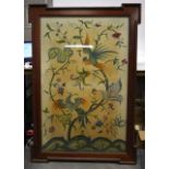 A VERY LARGE VICTORIAN MAHOGANY FRAMED EMBROIDERY depicting a parrot & other bird within an