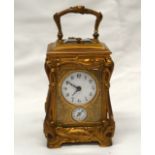 A FINE ART NOUVEAU FRENCH ORMOLU CARRIAGE CLOCK decorated with scrolling vines and acanthus, with