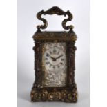 A LOVELY 19TH CENTURY FRENCH MINIATURE PALAIS ROYALE CARRIAGE CLOCK within a finely cast ormolu