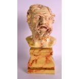 AN UNUSUAL EARLY 19TH CENTURY ENGLISH CREAMWARE POTTERY BUST modelled as a bearded male, supported