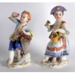 A GOOD PAIR OF MEISSEN FIGURES OF A MALE AND FEMALE modelled beside baskets and flowers and fruit,