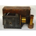 A LARGE BOXED VICTORIAN MAGIC LANTERN. 1Ft 8ins wide.