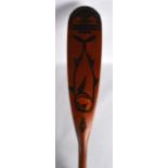 AN UNUSUAL NATIVE AMERICAN PAINTED WOODEN PADDLE possibly Tlingit or Haida, decorated with fish