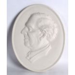 A LARGE OVAL PARIAN PLAQUE 'Austen Chamberlain'. 9.75ins x 1ft 1ins.