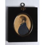 A GEORGE III PORTRAIT MINIATURE depicting a male within an ebonised frame. Image 2.5ins x 3.25ins.