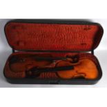 A RARE PAIR OF EARLY 20TH CENTURY ENGLISH VIOLINS within an unusual double case, Joseph Taylor of