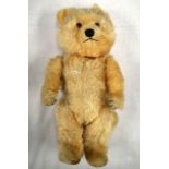 A CHARMING VINTAGE TEDDY BEAR with internal bell. 1Ft 2ins high.