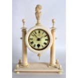 A GOOD 19TH CENTURY EUROPEAN CARVED IVORY MANTEL CLOCK with satyr central finial, the dial with