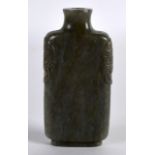 A 19TH CENTURY CHINESE CARVED MUTTON JADE SNUFF BOTTLE AND STOPPER with carved taotie mask heads.