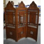 A VERY LARGE LIBERTY'S ISLAMIC INSPIRED WOODEN SCREEN decorated with calligraphy and mother of pearl