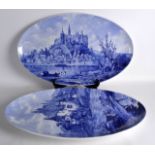 A LARGE PAIR OF LATE 19TH/20TH CENTURY CONTINENTAL BLUE AND WHITE DISHES decorated with